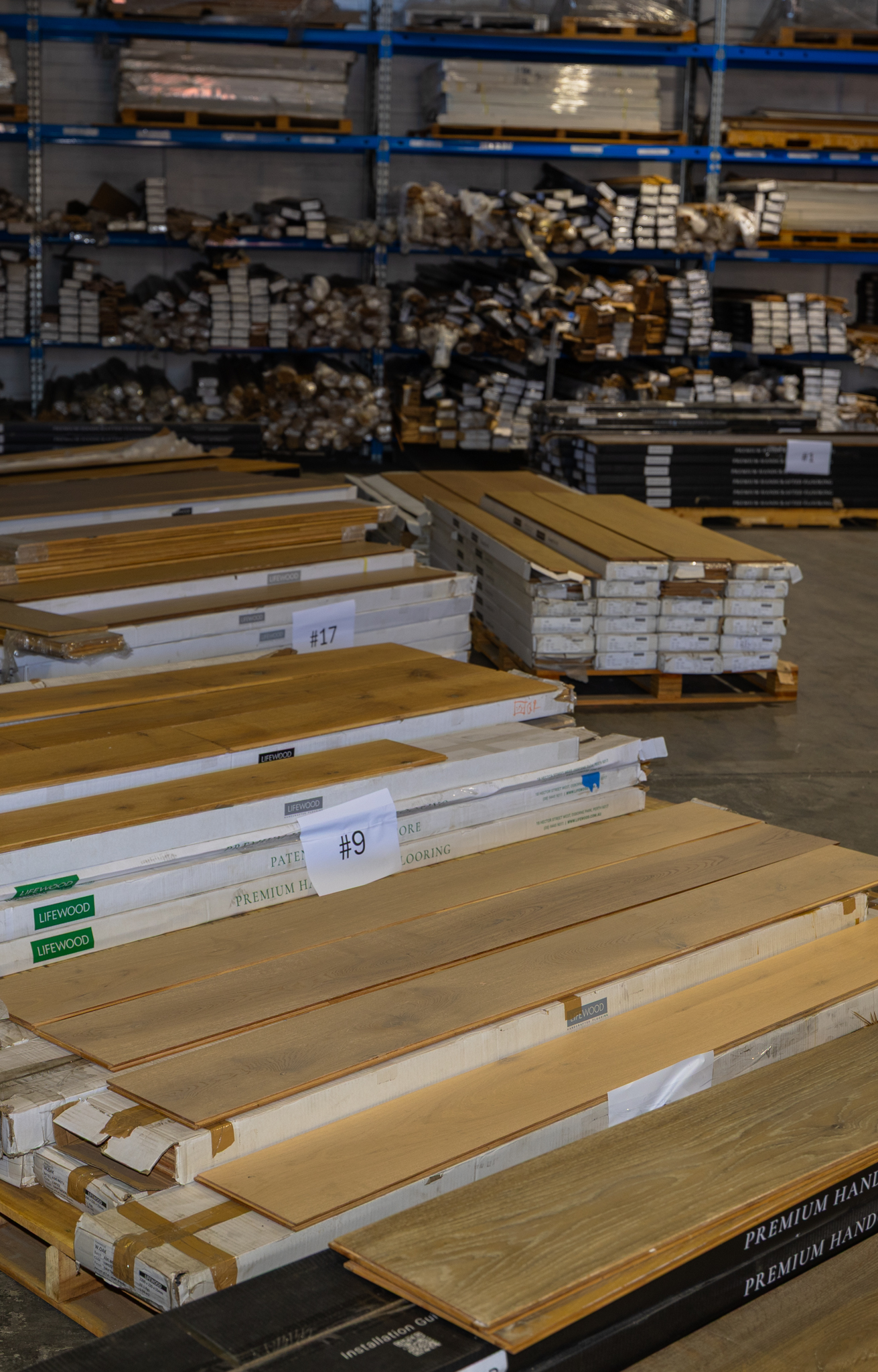 Lifewood warehouse clearance stock — premium timber flooring pallets ready for collection